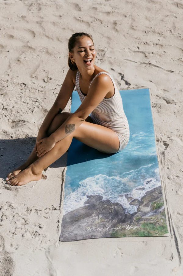 Transport yourself to wild, beautiful Piha with our eco-friendly 5mm-thick yoga mat. Extra grip, stunning aerial photography, and a carry strap included.