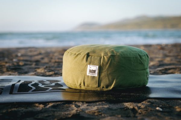 Enhance your meditation practice with our ultra-comfortable meditation cushion. 100% cotton washable exterior and buckwheat fill. Forest green or navy.