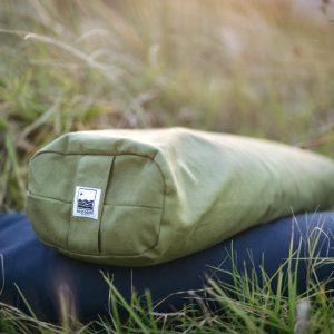 Elevate your restorative practice with our signature yoga bolster. 100% cotton washable cover made with natural dyes. Buckwheat fill.