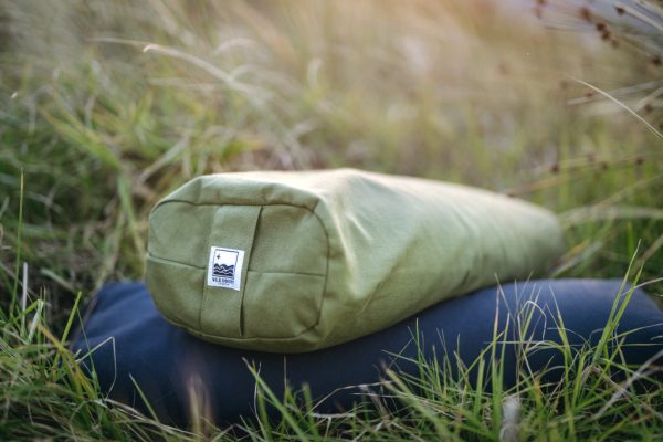 Elevate your restorative practice with our signature yoga bolster. 100% cotton washable cover made with natural dyes. Buckwheat fill.