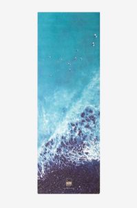 Lightweight, foldable travel yoga mats with beautiful aerial photography. Eco-friendly and non-toxic.